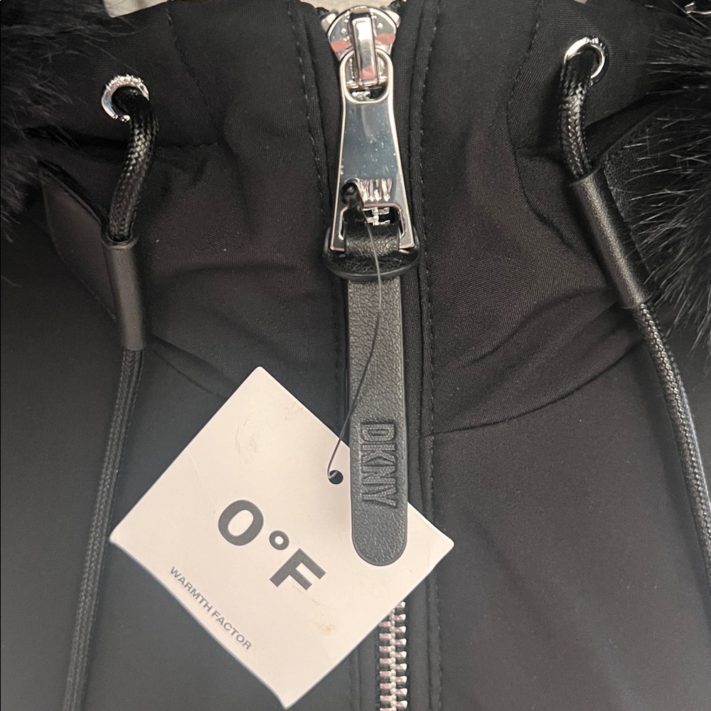 NWT / DKNY women’s black water-resistant parka with plush faux-fur hood. - Picture 2 of 3